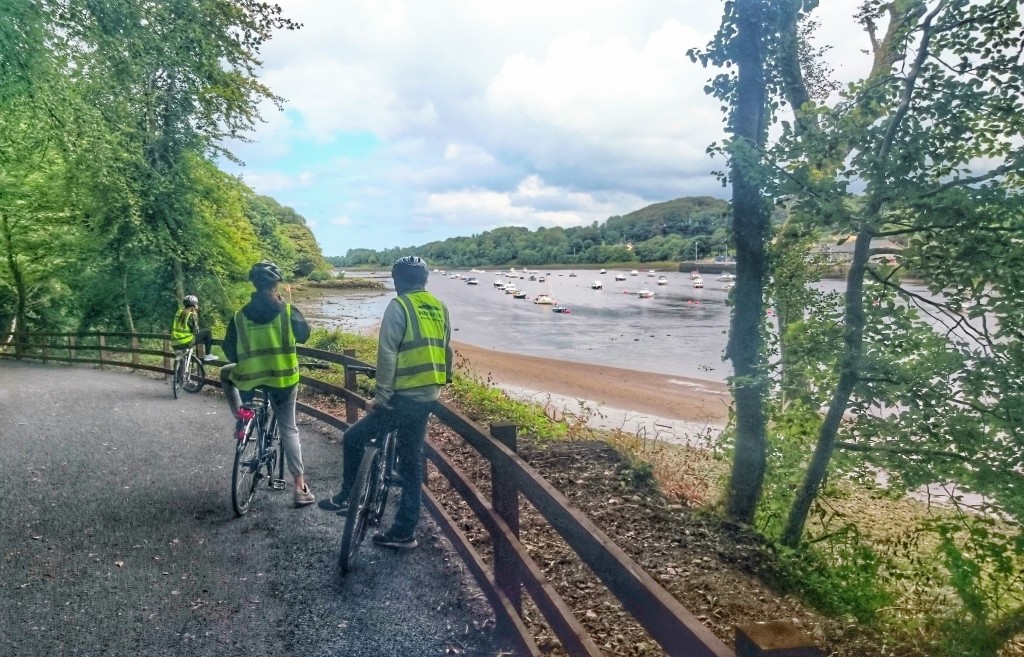 Cyclists overlooking the Quay in Ballina from Belleek Woods
